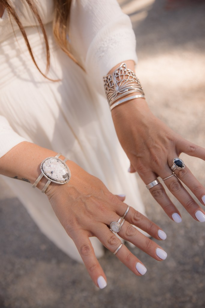 Beautiful sterling silver jewelry created for personal wedding. White Buffalo turquoise, sterling silver rings, bracelets.